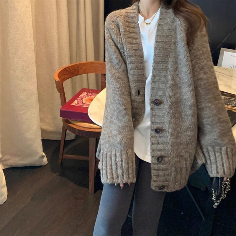 Dames gros tricot cardigan avec des manches volumineuses et décolleté à boutons Chic und Stil