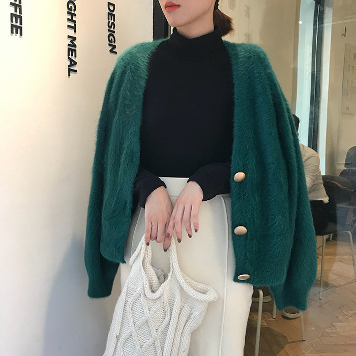 Dames Pull à cardigan douillet avec détails de boutons et design ample Chic und Stil