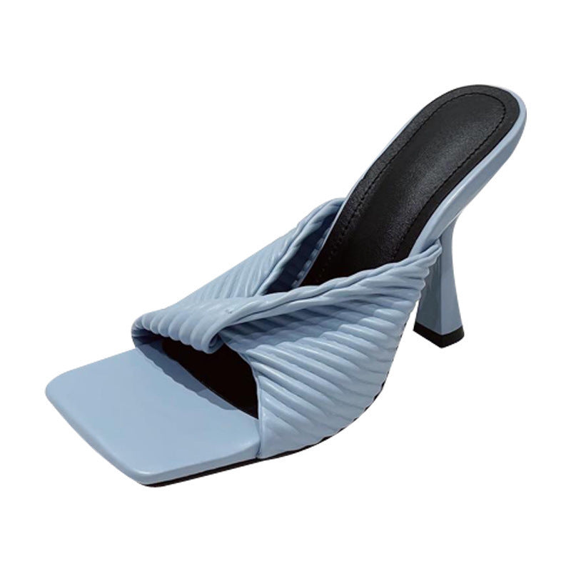 Mules raffinées pour dames avec design en nœud Chic und Stil