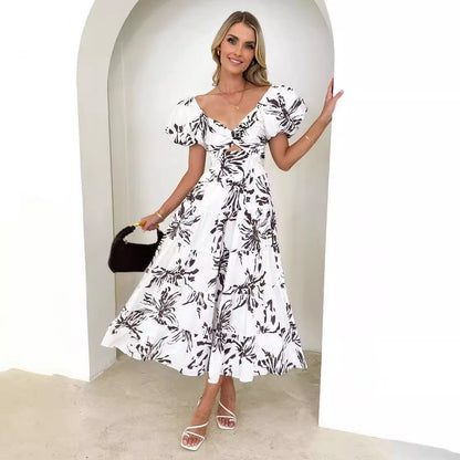 Robe maxi femme avec des manches ballon volumineuses et imprimé floral Chic und Stil