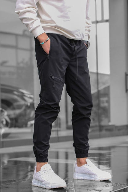 Light sporty pants for men with side zip pockets Chic and Style