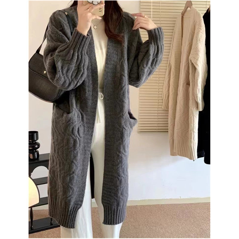 Cardigan en tricot pour femmes avec motif en relief et poches pratiques Chic und Stil