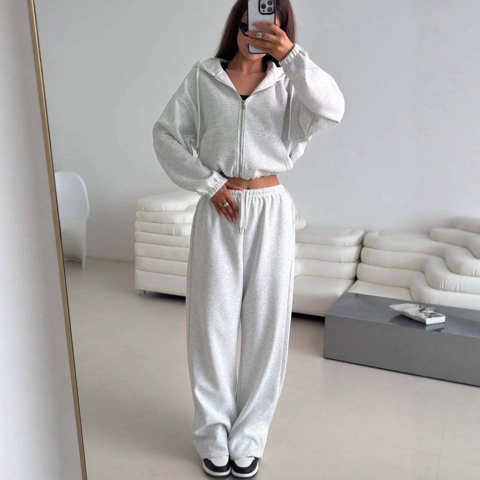 Fashionable women's hoodie with a short cut and matching jogger pants Chic and Style