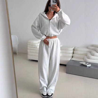 Fashionable women's hoodie with a short cut and matching jogger pants Chic and Style