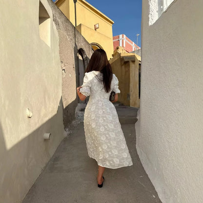 Robe maxi femme avec design de broderie florale et élégantes manches bouffantes Chic und Stil