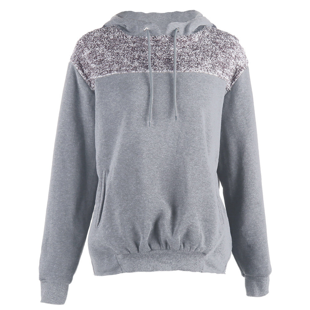 Pull à capuche pour femmes avec un design contrastant stylé et un ourlet élastique Chic und Stil