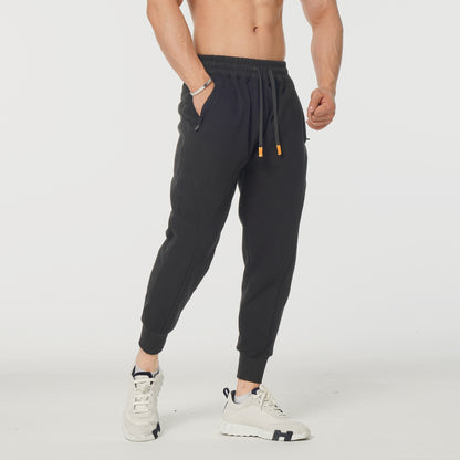 Men's sports pants with elastic waistband and side zip pockets Chic and Style