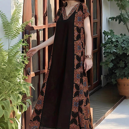 Robe maxi pour femmes avec des détails de broderie élaborés et une coupe fluide Chic und Stil