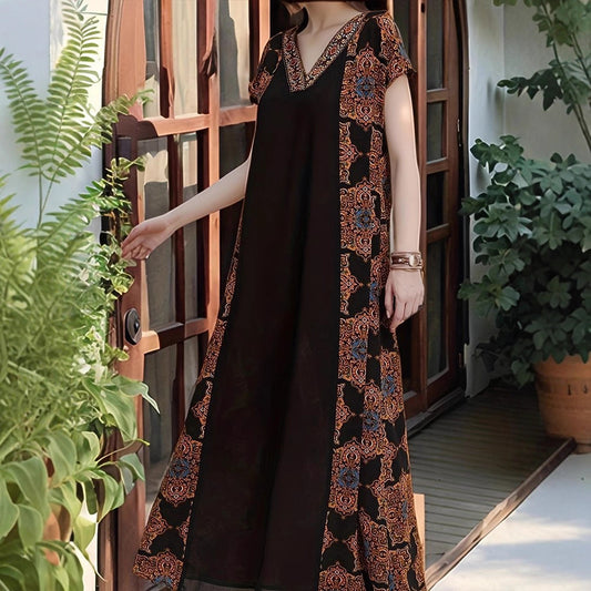 Robe maxi pour femmes avec des détails de broderie élaborés et une coupe fluide Chic und Stil