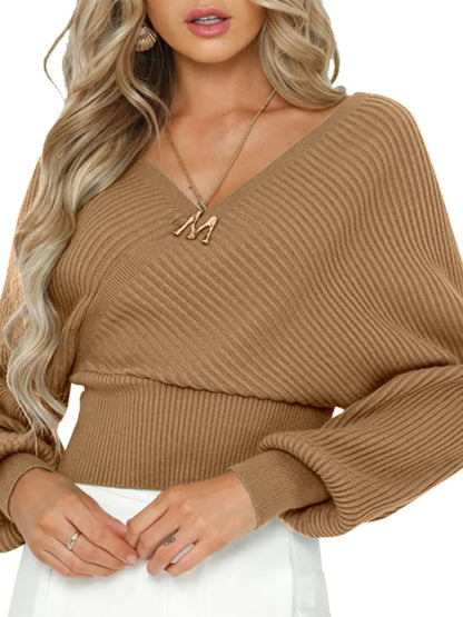 Pull femme décontracté à col en V avec des manches larges et une texture côtelée Chic und Stil