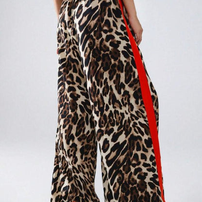 Wide linen pants for women with trendy leopard pattern and contrasting stripe Chic und Stil