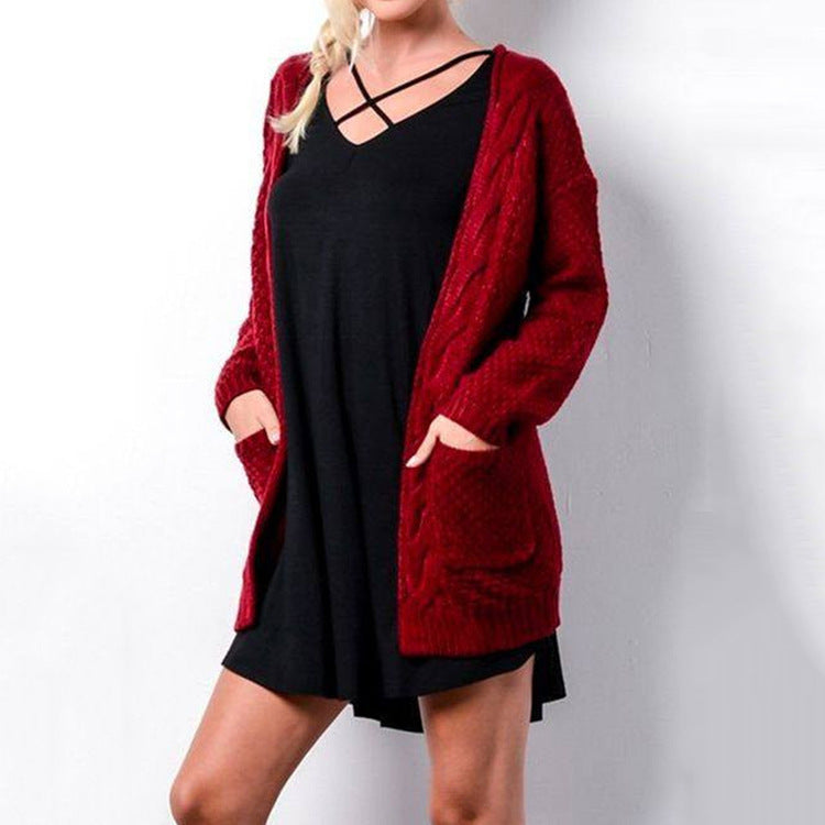 Veste en tricot pour femmes avec poches et structure à motifs en torsades détaillée Chic und Stil