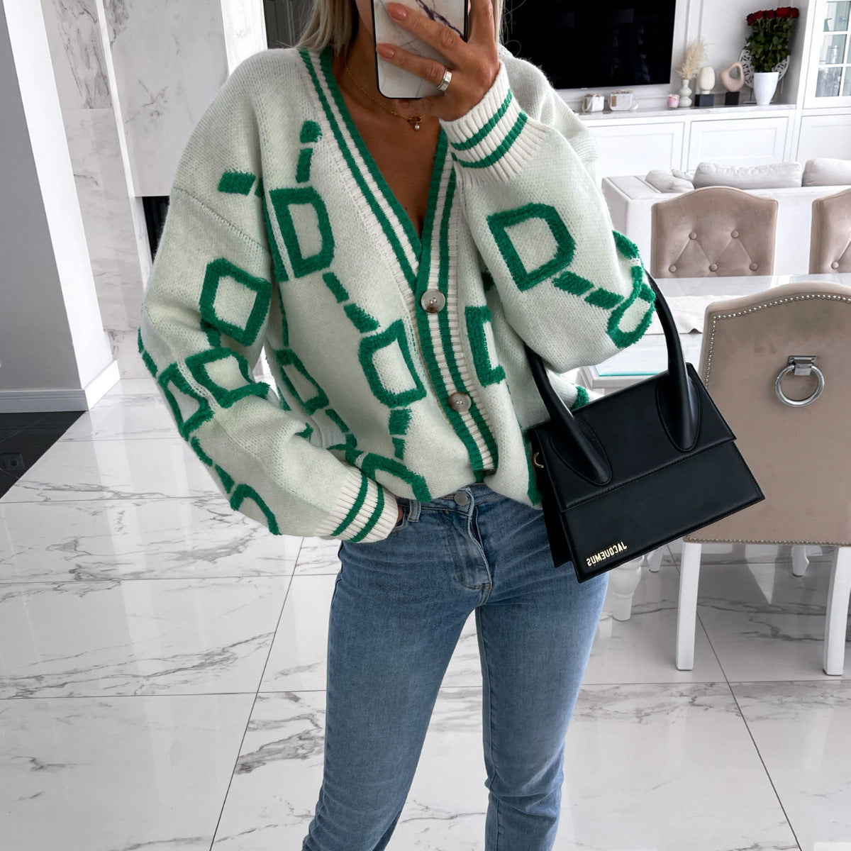 Cardigan féminin tricoté avec motif texturé et détails de boutons Chic und Stil