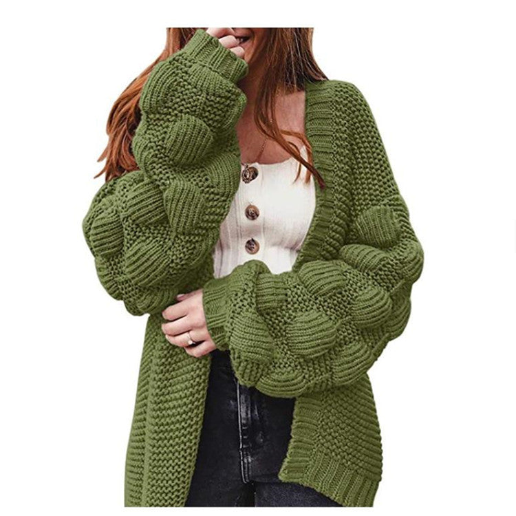 Veste en tricot pour femmes avec des manches bouffantes volumineuses et un aspect de maille structuré Chic und Stil