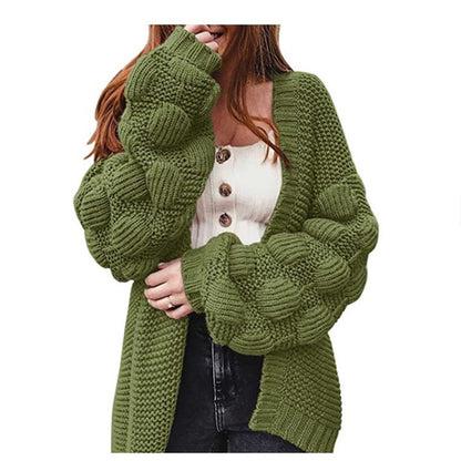 Veste en tricot pour femmes avec des manches bouffantes volumineuses et un aspect de maille structuré Chic und Stil