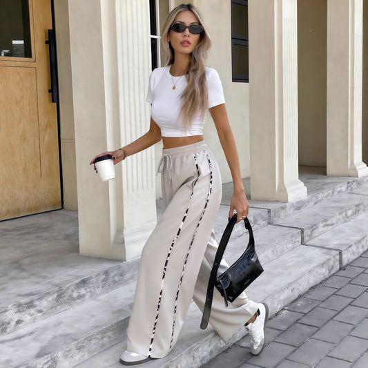 Wide sports pants for women with decorative side stripes Chic and Style