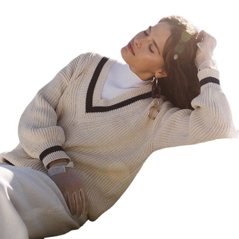 Pull oversized en tricot femme avec décolleté en V et manches rayées Chic und Stil