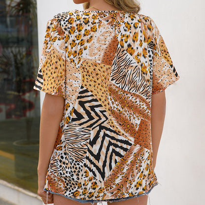 Blouse à motif animal pour femmes avec décolleté en V et manches amples Chic und Stil