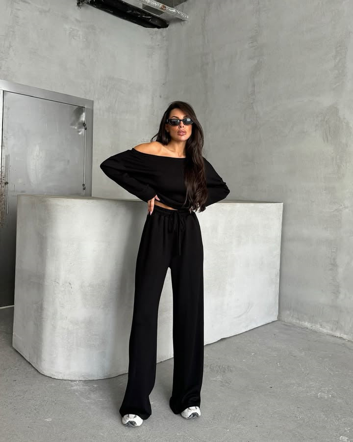 Combinaison décontractée pour femmes avec des jambes larges et un design off-shoulder Chic und Stil