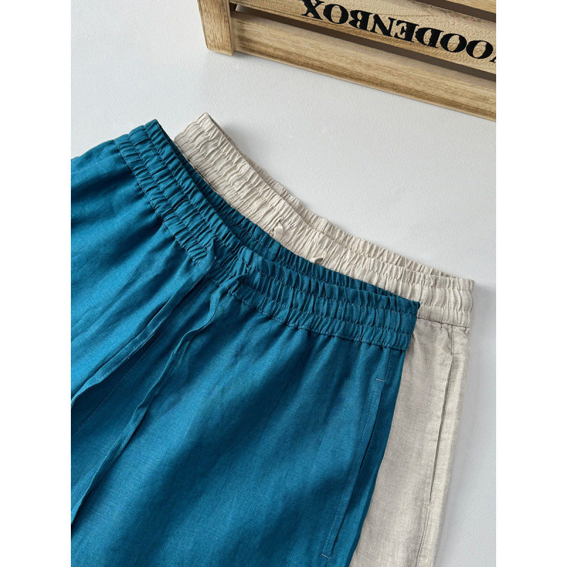 Casual linen pants for women with elastic waist and side pockets with openings.