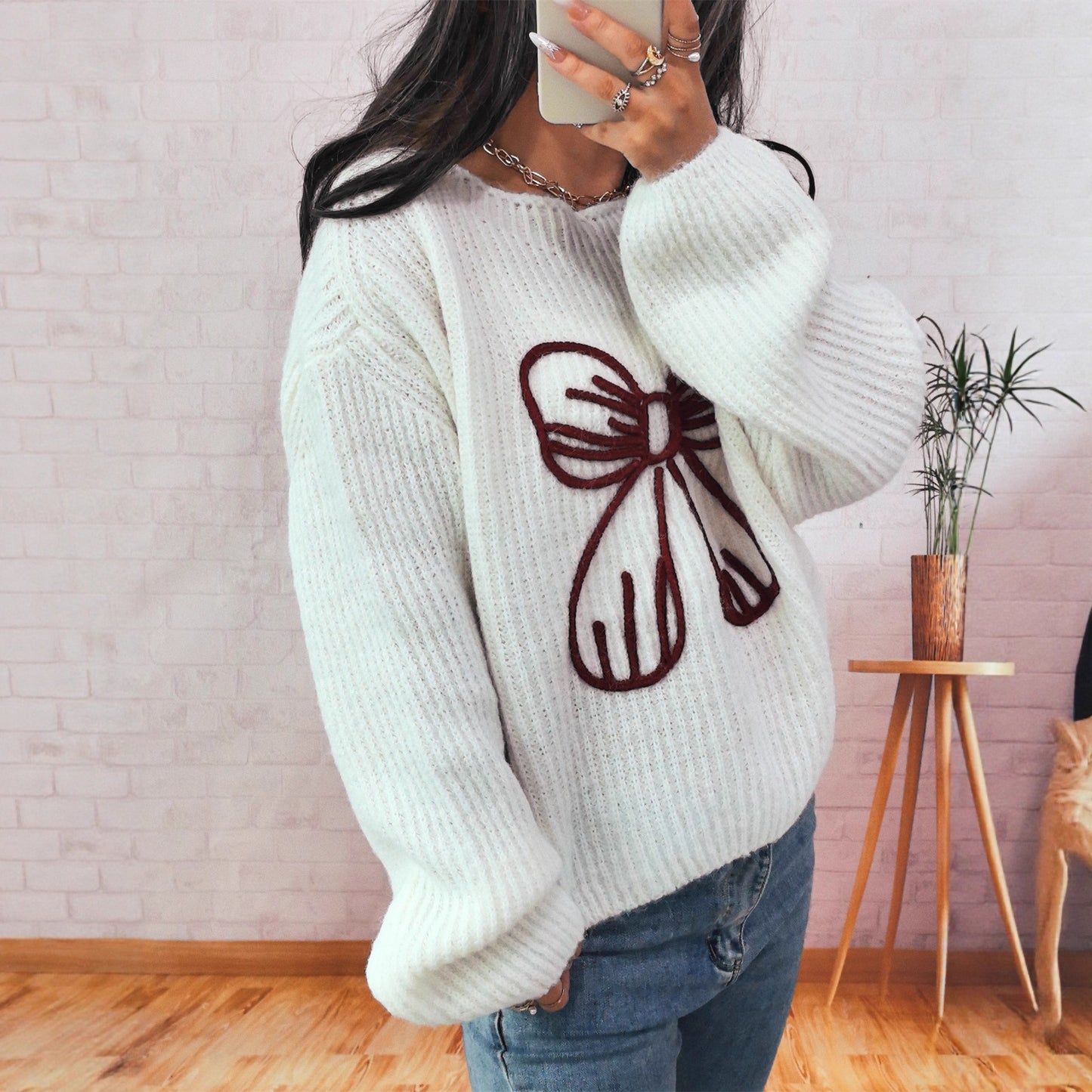 Pull en grosse maille pour femmes avec motif de nœud ludique Chic und Stil