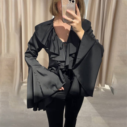 Blouse femme avec des détails volumineux en dentelle et des manches larges Chic und Stil