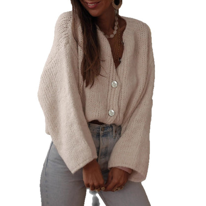 Dames pull-over confortable avec des manches surdimensionnées et de élégants boutons en perles Chic und Stil