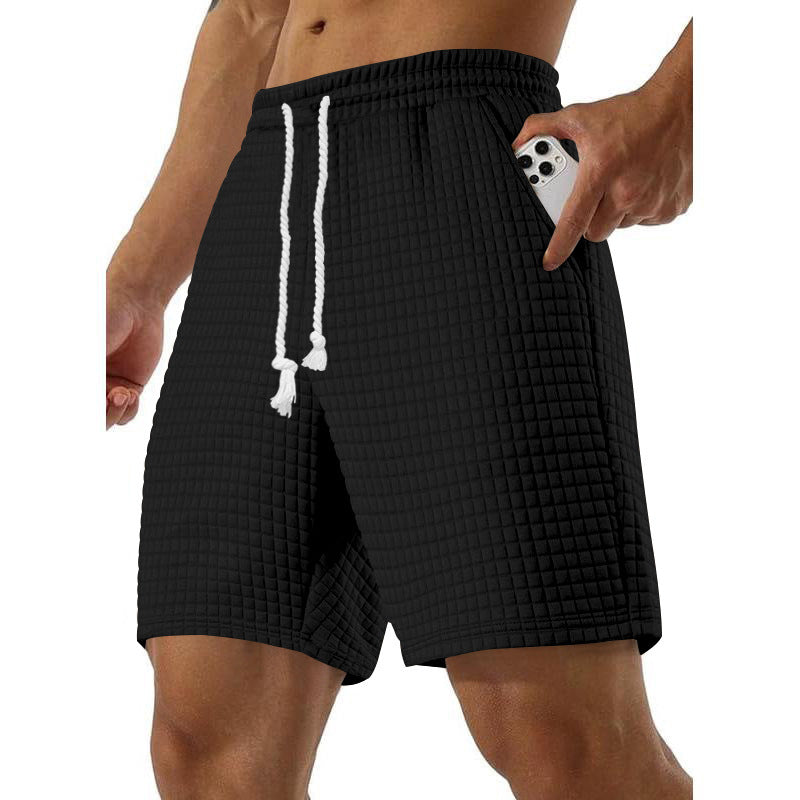 Shorts de sport pour hommes en material respirant avec poches latérales pratiques Chic und Stil