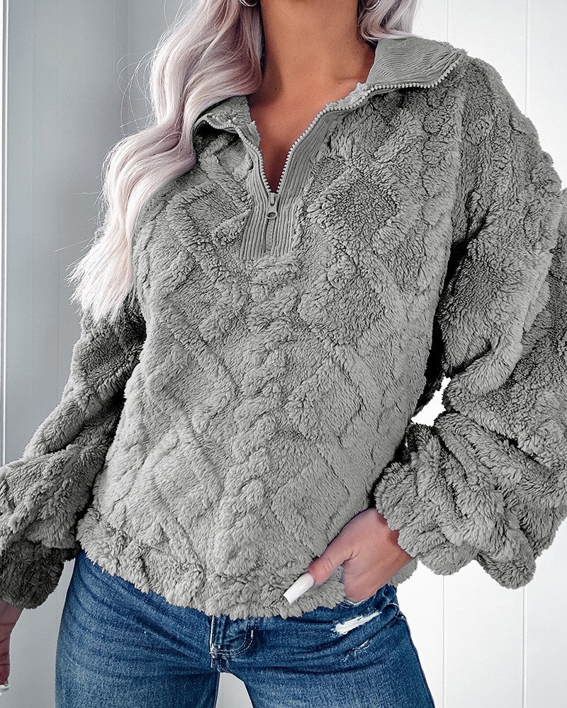 Pull en fleece douillet pour femmes avec demi-fermeture éclair et manches bouffantes Chic und Stil