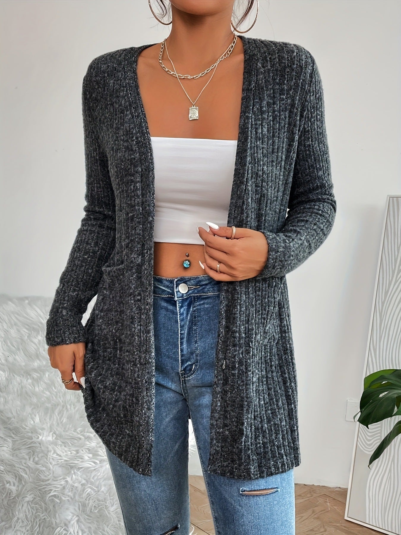 Veste en tricot pour femmes avec design côtelé texturé et poches pratiques Chic und Stil