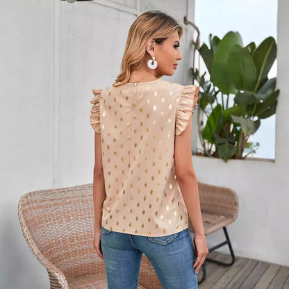 Chemisier pour femmes avec des détails en volants et un motif à pois dorés Chic und Stil