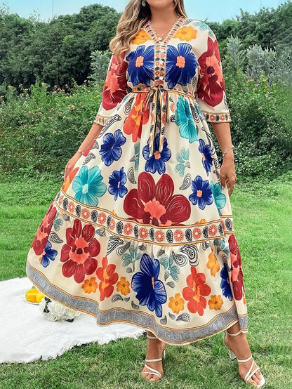Robe maxi femme avec design floral coloré et ceinture à la taille Chic und Stil