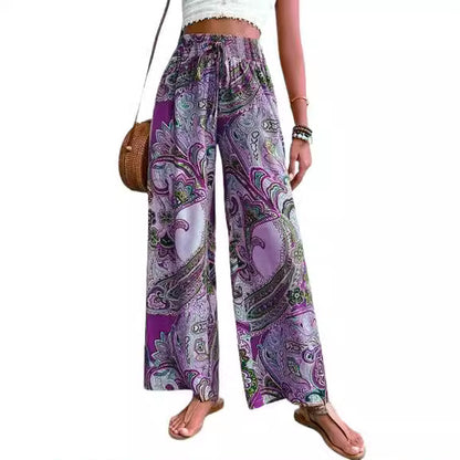 Wide palazzo pants for women with a colorful paisley pattern and an elastic waistband Chic und Stil