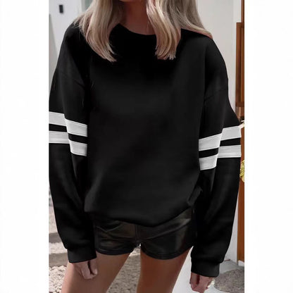 Pull oversized sportif pour femmes avec des accents rayés et une coupe décontractée Chic und Stil