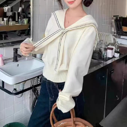Pull femme élégant avec col à nœud et fine structure en tricot Chic und Stil