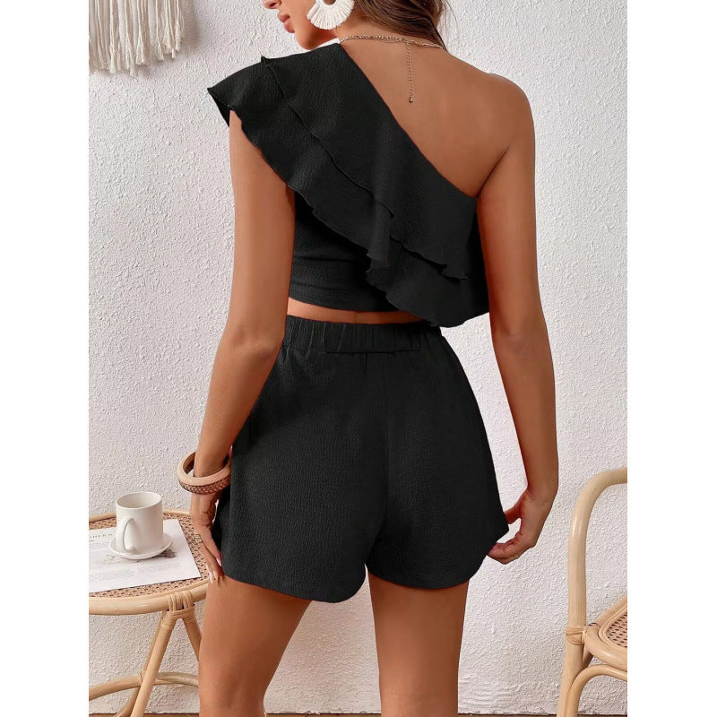Woman One-Shoulder Ruffle Crop Top and High-Waisted Shorts Chic and Style