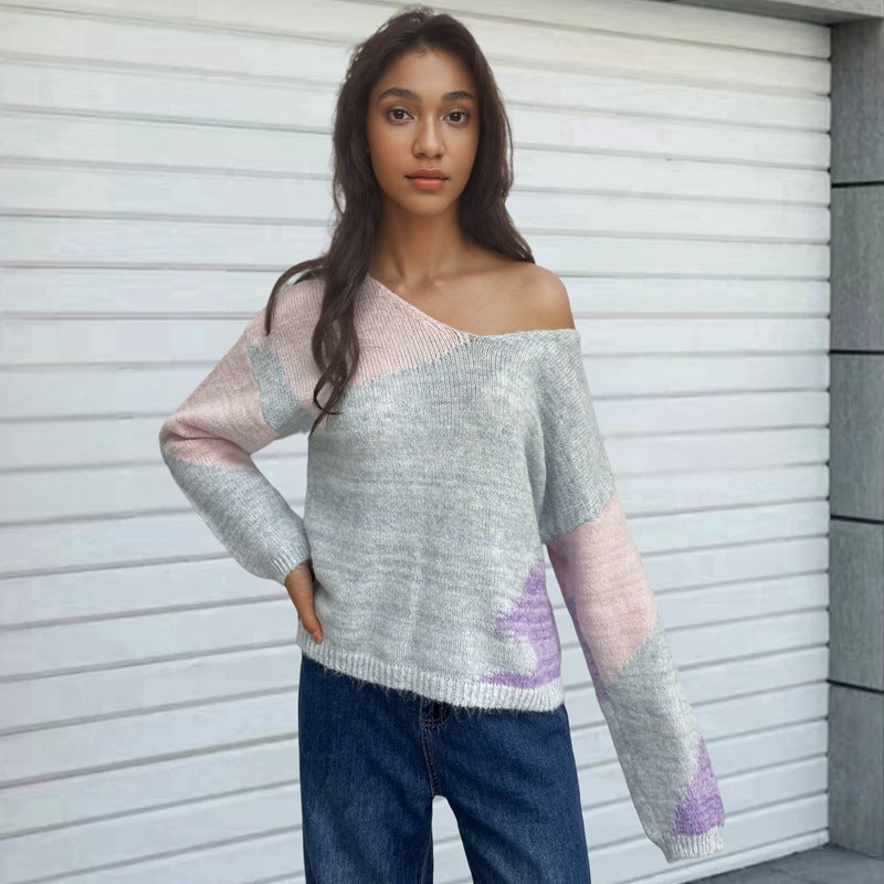 Pull créatif pour femmes en tricot avec décolleté asymétrique et design coloré Chic und Stil