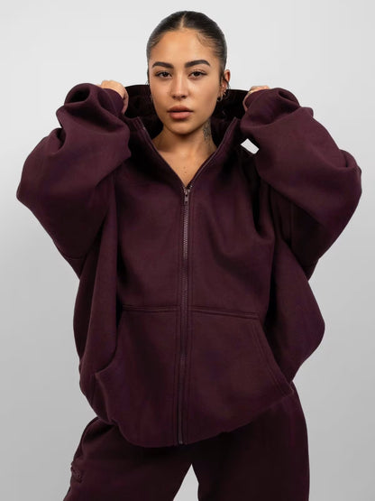 Femmes pull à capuche oversized à la mode avec pantalon de jogging assorti Chic und Stil