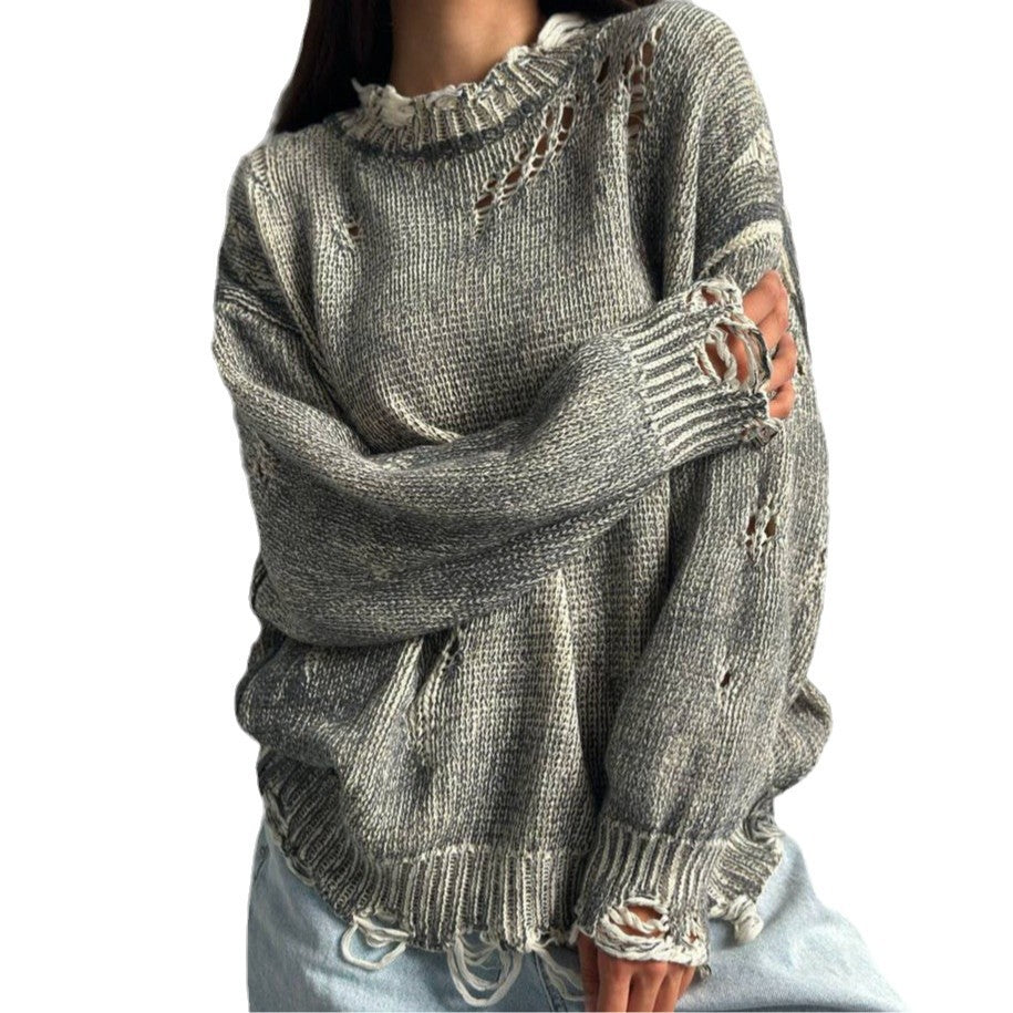 Ladies oversized knitted casual pullover with a unique hole pattern Chic and Style