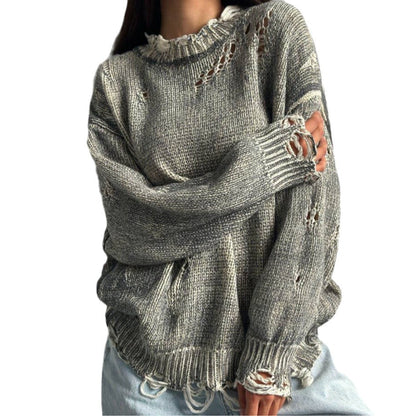 Ladies oversized knitted casual pullover with a unique hole pattern Chic and Style