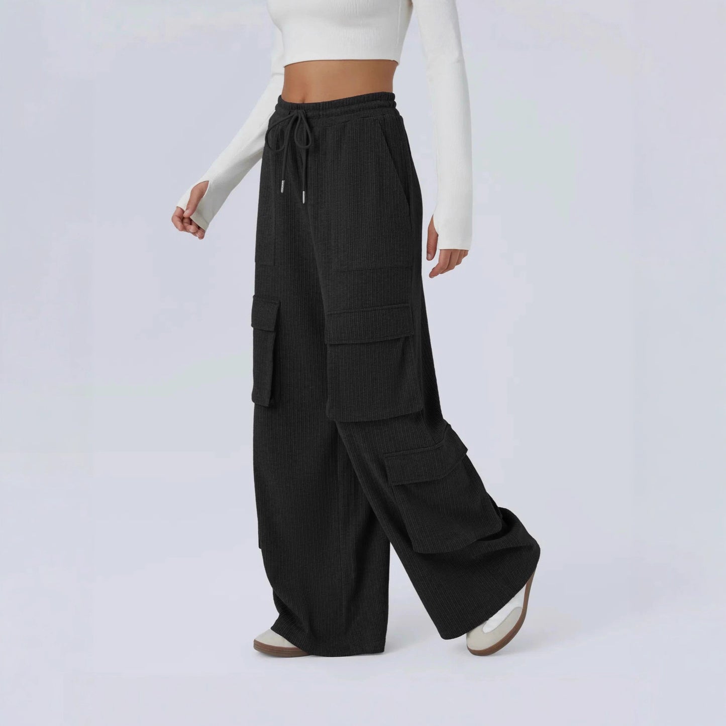 Ladies cargo pants with a wide cut and practical side pockets Chic and Style