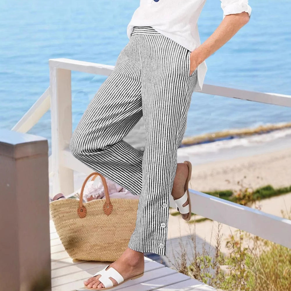 Long striped pants for women with button details and side pockets Chic und Stil