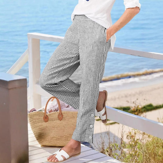 Long striped pants for women with button details and side pockets Chic und Stil