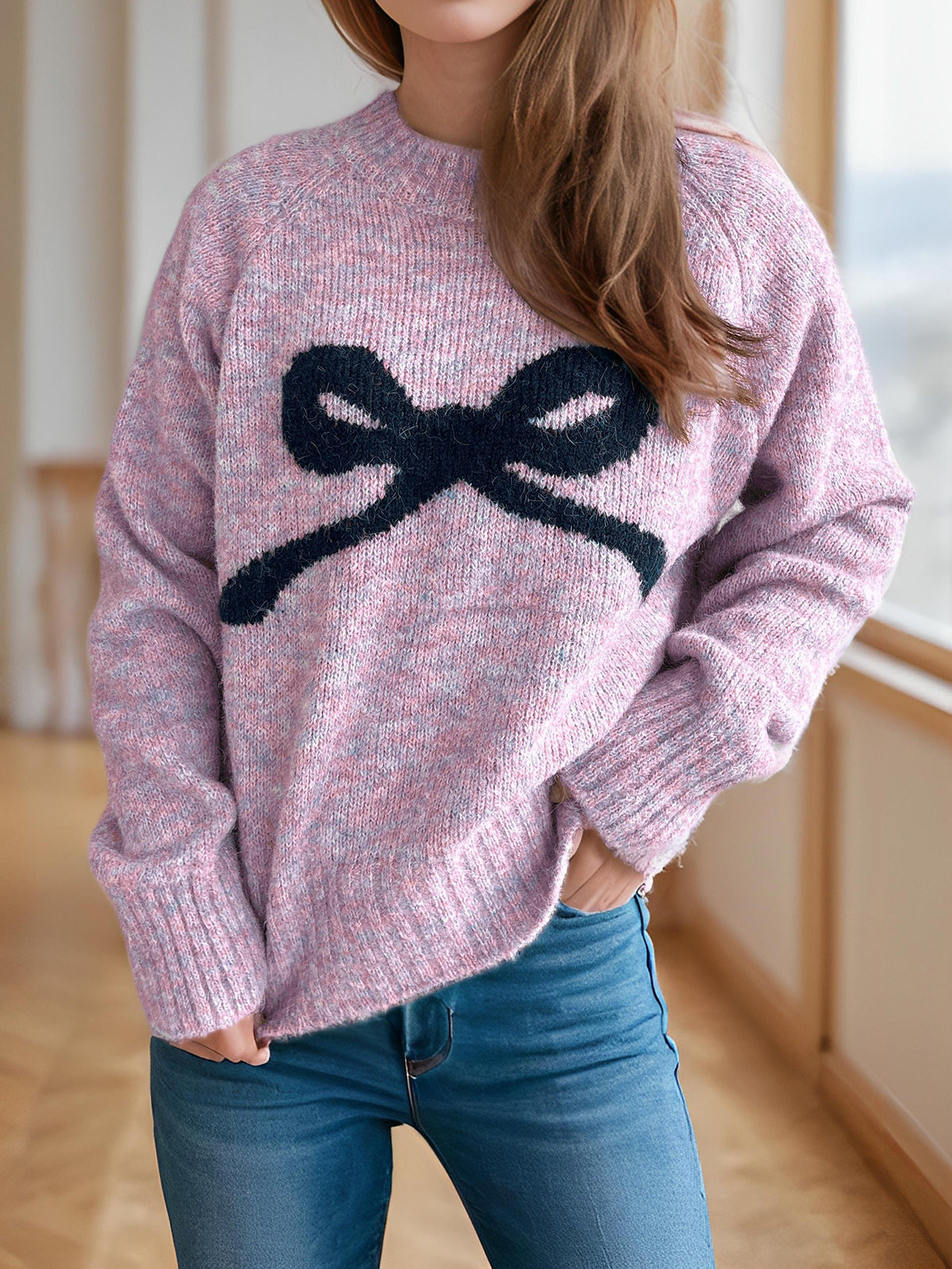 Pull confortable pour femmes avec motif de nœud ludique Chic und Stil