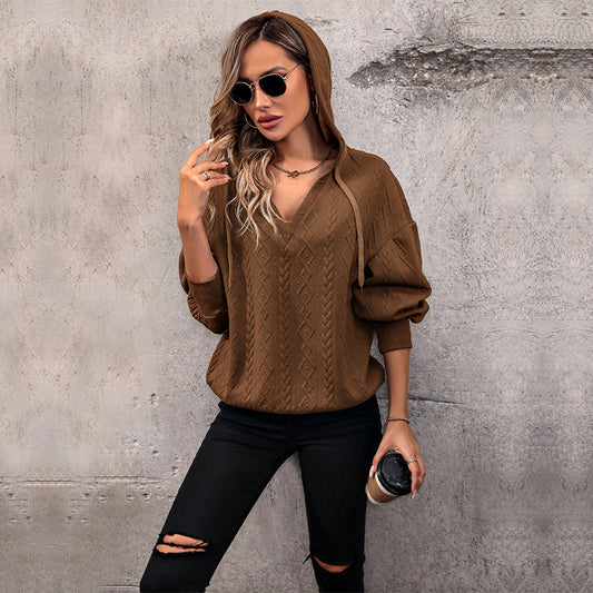 Pull femme avec capuche et design texturé Chic und Stil