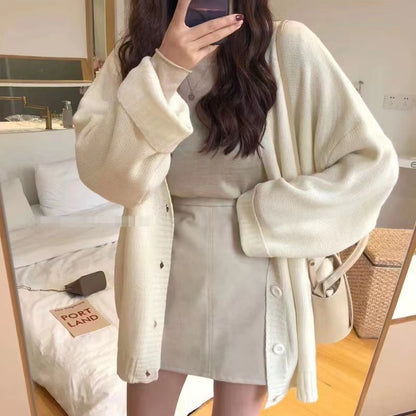 Cardigan en tricot décontracté pour femmes avec des manches volumineuses et une patte de boutonnage Chic und Stil
