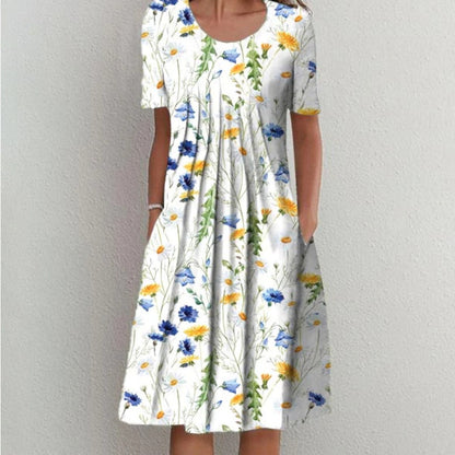 Robe midi femme à fleurs avec design plissé Chic und Stil