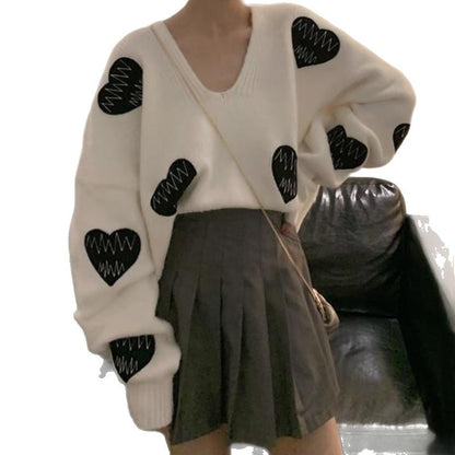 Pull femme en peluche avec motif en forme de cœur Chic und Stil