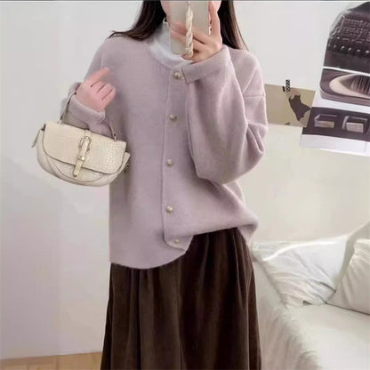 Cardigan en tricot douillet pour femmes avec de jolis boutons et une coupe ample Chic und Stil
