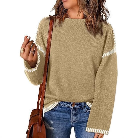 Pull féminin à la mode avec un matériau structuré et des détails en forme de rayures Chic und Stil